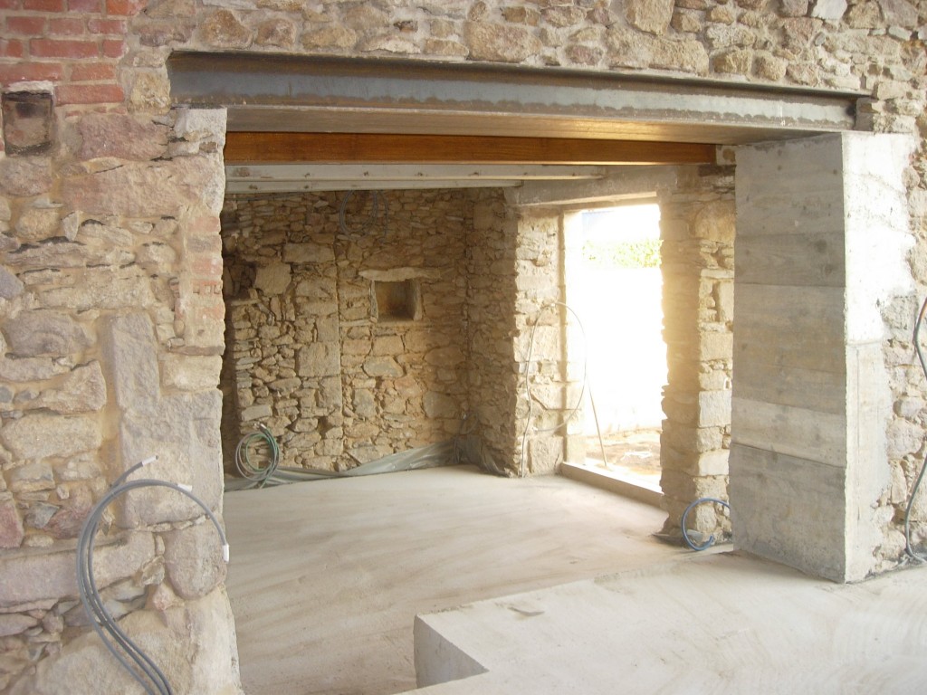 Ouverture de mur en pierre, en béton à Nestier